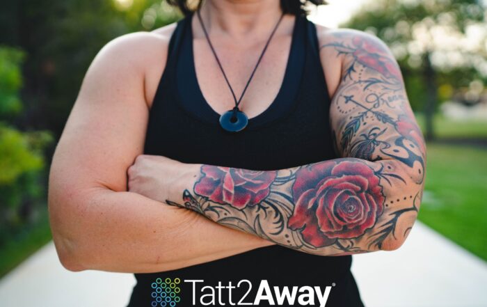 a woman with a red arm sleeve tattoo