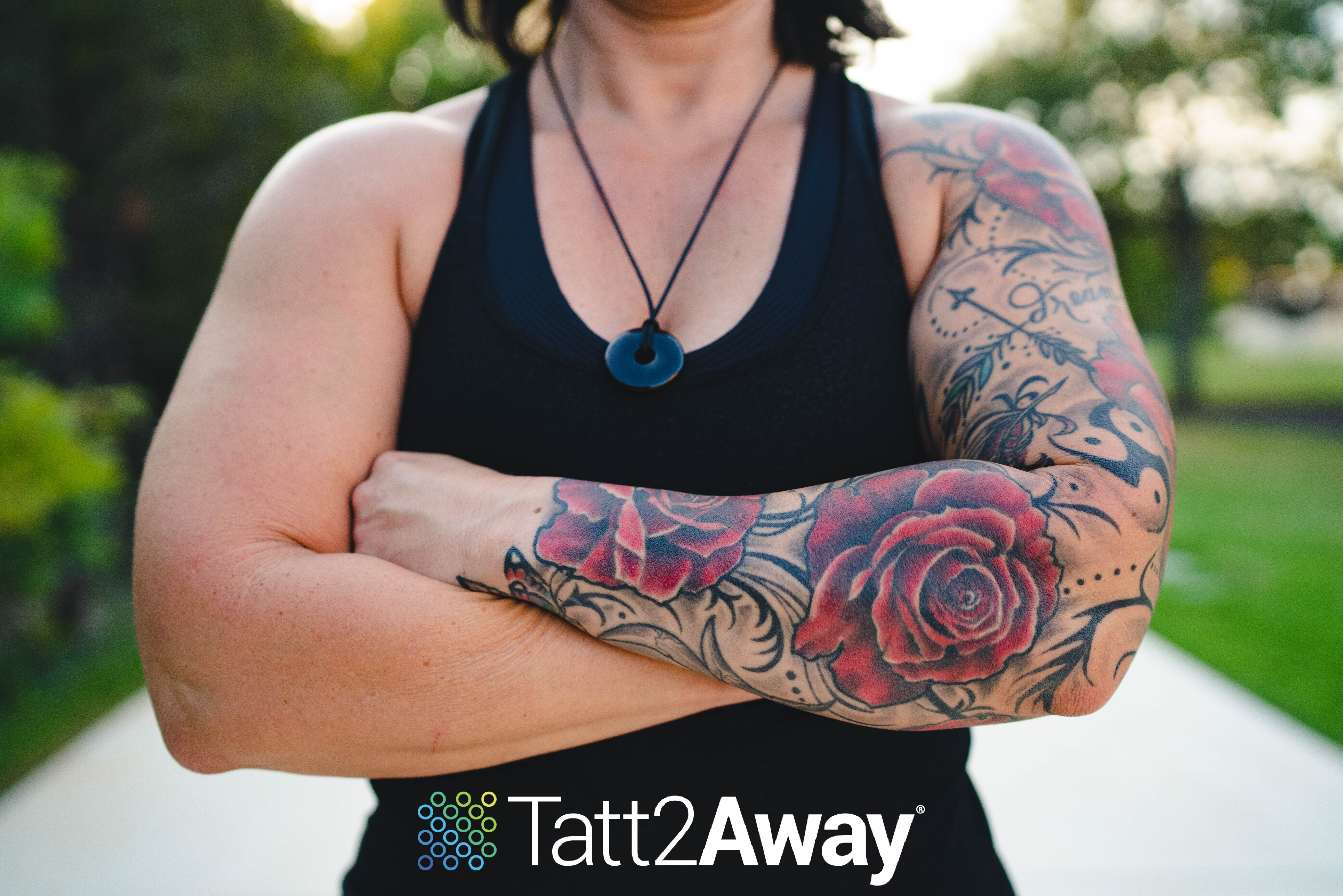 a woman with a red arm sleeve tattoo