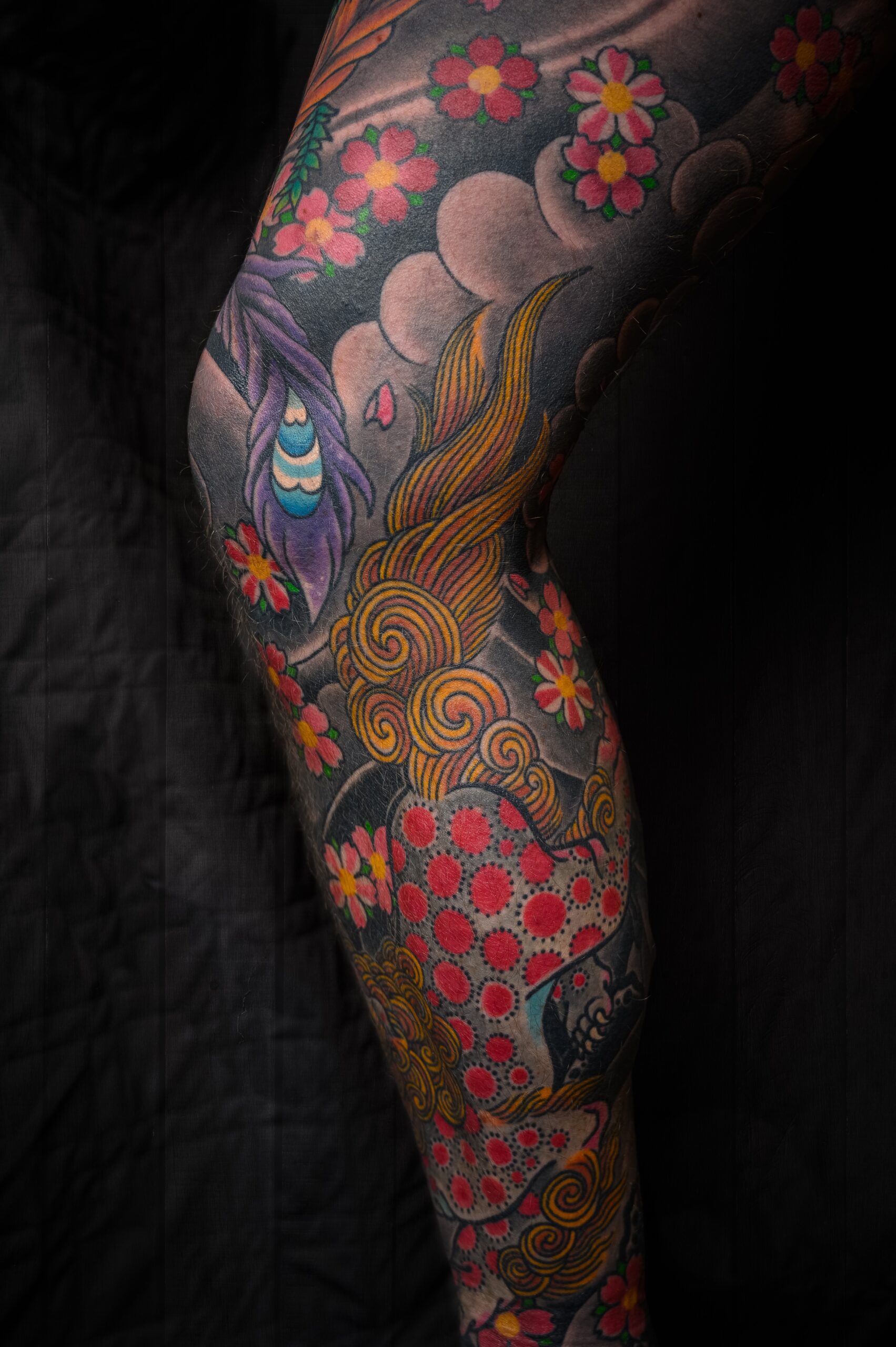 colorful tattoo on leg