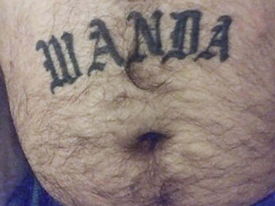 a man with a name tattoo on his belly called wanda